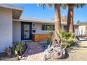 Beautiful brick pathway to front door with unique desert landscaping at 4714 N Miller Rd, Scottsdale, AZ 85251