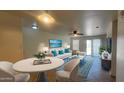 Staged living room with contemporary furniture, creating an inviting and stylish space to relax and entertain guests at 6630 W Superior Ave, Phoenix, AZ 85043