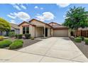 Attractive single-story home boasting desert landscaping and attached garage in a suburban neighborhood at 12775 W Lowden Rd, Peoria, AZ 85383
