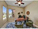 Comfortable home office with large window and decorative rug at 12903 W Brookhart Way, Peoria, AZ 85383