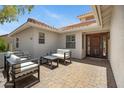 Relaxing courtyard with outdoor seating and a brick-paved floor, perfect for entertaining guests at 13010 S 42Nd St, Phoenix, AZ 85044