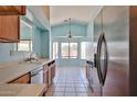 Bright eat-in kitchen area featuring a large window overlooking the yard at 16242 W Caribbean Ln, Surprise, AZ 85379