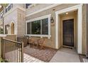 Charming front patio with brick pavers and seating area near the entrance at 1825 E Hampton Ln # 108, Gilbert, AZ 85295