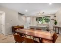 Open-concept living and dining area with modern furnishings and fixtures at 1825 E Hampton Ln # 108, Gilbert, AZ 85295
