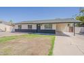 Well-maintained single-story home with covered carport, featuring fresh exterior paint and landscaping at 2130 W Cindy St, Chandler, AZ 85224