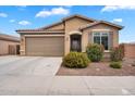 Well-maintained single-story home with a two-car garage and drought-tolerant landscaping at 2264 W Arroyo Way, San Tan Valley, AZ 85144