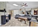 Bright living room with tile floors, fireplace and plenty of seating at 5144 W Sweetwater Ave, Glendale, AZ 85304