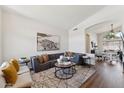 Modern living area with hardwood floors, neutral colors, and an open floor plan at 1029 E Jasper Dr, Gilbert, AZ 85296
