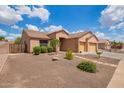 Beautiful home with a well-maintained yard, desert landscaping, and an inviting front entrance at 16609 N 40Th Dr, Phoenix, AZ 85053