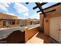 Inviting courtyard area with brick pavers and pergola, great curb appeal at 37222 N Tom Darlington Dr # 15, Carefree, AZ 85377