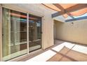 Spacious covered patio with sliding glass doors and convenient access to indoor living spaces at 620 S Allred Dr, Tempe, AZ 85288