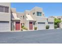 Inviting multi-story townhome showcases a private entrance and attached garage at 11260 N 92Nd St # 2054, Scottsdale, AZ 85260