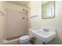 Small, functional bathroom with a stand-up shower and basic fixtures at 230 E Fairmont Dr, Tempe, AZ 85282