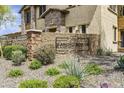 Rancho North community signage surrounded by desert landscaping and stone features at 5100 E Rancho Paloma Dr # 1029, Cave Creek, AZ 85331