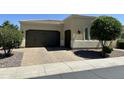 Charming single-Gathering home featuring a well-kept lawn and a two-car garage at 562 E Vesper Trl, Queen Creek, AZ 85140