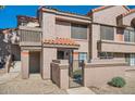 Charming two-story condo with gated entry, desert landscaping, and private courtyard at 700 E Mesquite Cir # J135, Tempe, AZ 85288