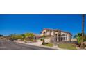 Lovely two-story home with a three-car garage and well-maintained landscaping in a desirable neighborhood at 818 E Hiddenview Dr, Phoenix, AZ 85048