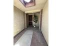 Inviting entryway with brick accents and a stylish security door at 11249 N 161St Ave, Surprise, AZ 85379