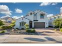 Charming two-story home boasts attractive desert landscaping, mountain views and a two-car garage at 21194 W Hillcrest Blvd, Buckeye, AZ 85396