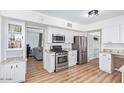 Well-lit kitchen featuring stainless steel appliances and granite countertops at 2425 W Shady Glen Ave, Phoenix, AZ 85023