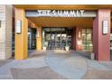 A building entrance at The Summit featuring symmetrical planters and modern architectural details at 310 S 4Th St # 601, Phoenix, AZ 85004