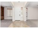 Elegant entryway with tile flooring, neutral walls, and access to multiple living spaces at 4520 N 151St Dr, Goodyear, AZ 85395
