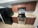 Functional kitchen showcasing stainless steel oven and ample countertop space for meal prep at 6911 W Devonshire Ave # 1269, Phoenix, AZ 85033