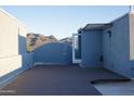 Rooftop deck with an outdoor covered area and views of nearby mountains at 120 W Milada Dr, Phoenix, AZ 85041