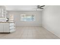 Bright dining area featuring tile flooring and a large window with lots of natural light at 12201 N 22Nd Pl, Phoenix, AZ 85022