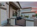Cozy front porch with chairs, a gate, and easy access to the house at 2336 W Laredo Ln, Phoenix, AZ 85085