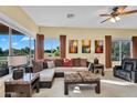 Relaxing living room with ample natural light and comfortable seating arrangements at 4906 S Verbena Ave, Gilbert, AZ 85298