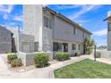 Condo exterior with manicured landscaping and community-style living at 745 N Dobson Rd # 144, Mesa, AZ 85201