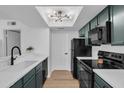 Modern kitchen with stainless steel appliances and ample counter space at 745 N Dobson Rd # 144, Mesa, AZ 85201