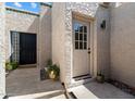Inviting front entrance with security door, and lovely planters at 1120 E Beryl Ave, Phoenix, AZ 85020