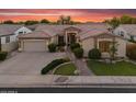Inviting single-Gathering home with beautiful landscaping, stone accents, mature trees, and a winding walkway at 1410 S Los Altos Dr, Chandler, AZ 85286