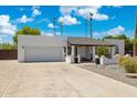 Inviting single-Gathering home with a well-maintained driveway and appealing facade on a sunny day at 1452 E Gary St, Mesa, AZ 85203
