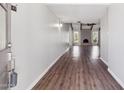 Welcoming foyer with hardwood floors leading to a spacious living area with fireplace at 1452 E Gary St, Mesa, AZ 85203