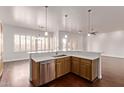 Bright kitchen featuring quartz countertops and stainless steel appliances at 279 W Stirrup Ln, San Tan Valley, AZ 85143