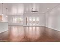 Spacious living room featuring hardwood floors and abundant natural light at 279 W Stirrup Ln, San Tan Valley, AZ 85143