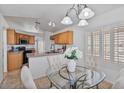 Well-lit kitchen with stainless steel appliances and a cozy breakfast nook at 3338 E Lavey Ln, Phoenix, AZ 85032
