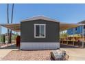 Cozy home with an extended carport and desert landscaping for low maintenance living at 12811 N 19Th Pl, Phoenix, AZ 85022