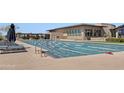 Community pool offers lap lanes and comfortable seating areas at 20801 N 90Th Pl # 255, Scottsdale, AZ 85255
