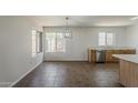 Bright kitchen with stainless steel appliances and tile floors at 3282 S Warner Dr, Apache Junction, AZ 85120