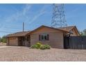 Single-story home featuring a low maintenance yard and an inviting facade at 5204 E Colby St, Mesa, AZ 85205