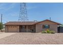 Lovely single-story home with well-maintained landscaping and neutral color scheme at 5204 E Colby St, Mesa, AZ 85205