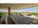 Spacious patio area with plush seating, ideal for outdoor gatherings and enjoying mountain views at 7117 E Rancho Vista Dr # 6007, Scottsdale, AZ 85251