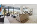 Bright living room features an expansive seating area and large windows with a beautiful view at 7180 E Kierland Blvd # 916, Scottsdale, AZ 85254