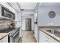 Kitchen view showcasing stainless steel appliances, granite countertops and ample cabinet space at 7625 E Camelback Rd # B138, Scottsdale, AZ 85251
