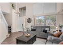 Bright living room featuring high ceilings, ample natural light, and neutral decor at 1574 E Scott Ave, Gilbert, AZ 85234