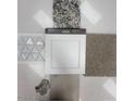 Sample of the home finishes including floor, tile, backsplash, and granite countertop options at 4416 S 127Th Ave, Avondale, AZ 85323